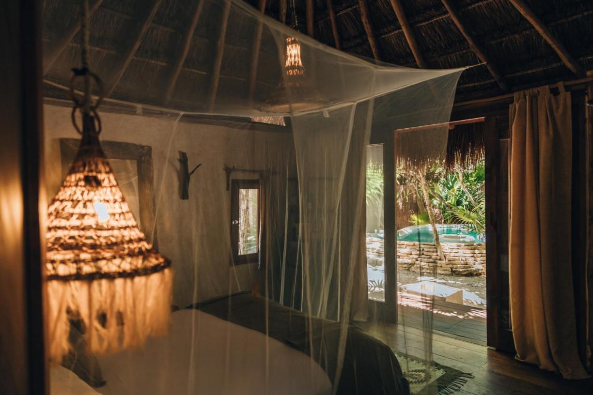 Ikal Tulum Hotel Exterior foto Interior of a bungalow